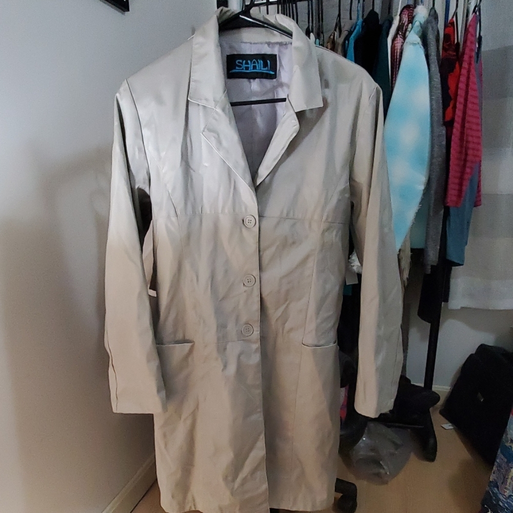 Womans tan leather coat- size M